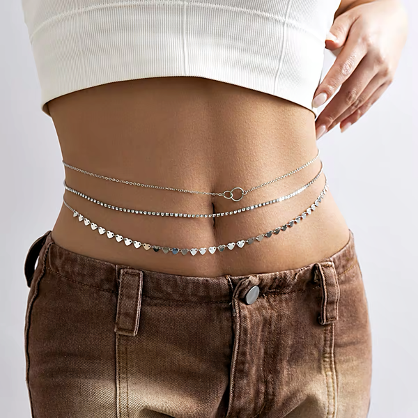 Silver-plated 3 layer body chain with a delicate chain row with connecting circles on the top, a middle row of diamantés  and a bottom row of silver hearts.